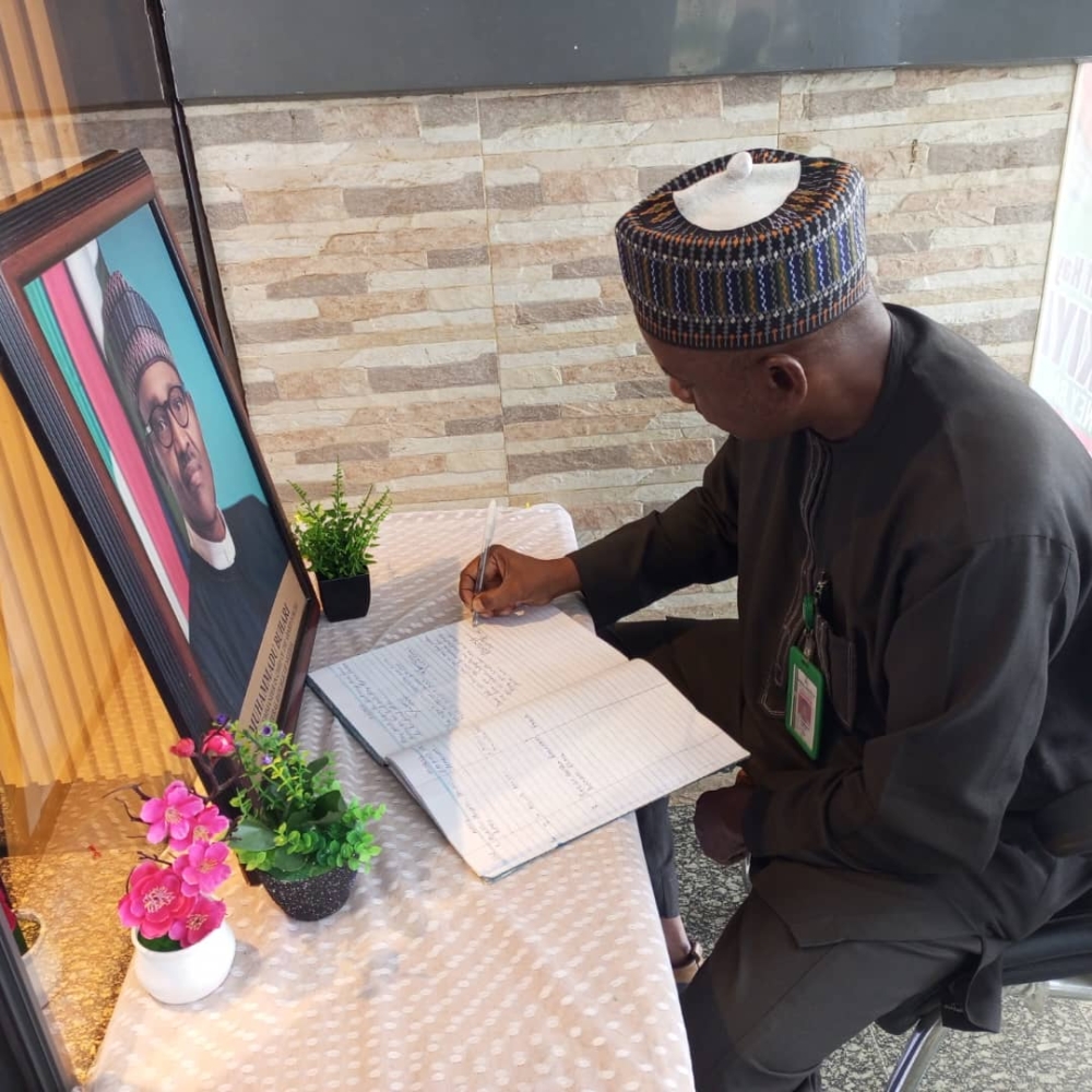 The Permanent Secretary,  Federal Ministry of Housing and Urban Development,  Dr Shuaib Belgore, led Management staff of the Ministry to sign the condolence register in honour of the late former President of the Federal Republic of Nigeria, His Excellency Muhammadu Buhari, GCFR, at the FMHUD heaquarters,  Mabushi, Abuja.